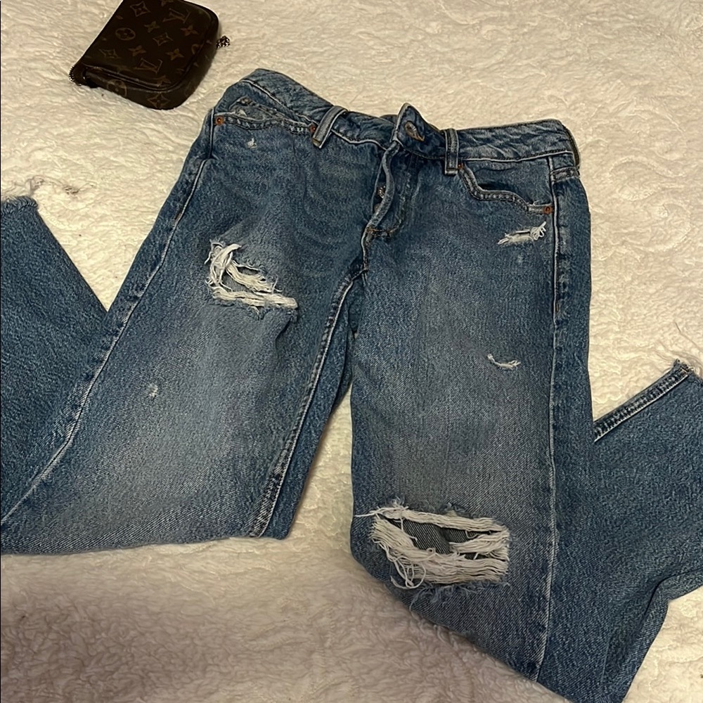 Distressed Blue Jeans